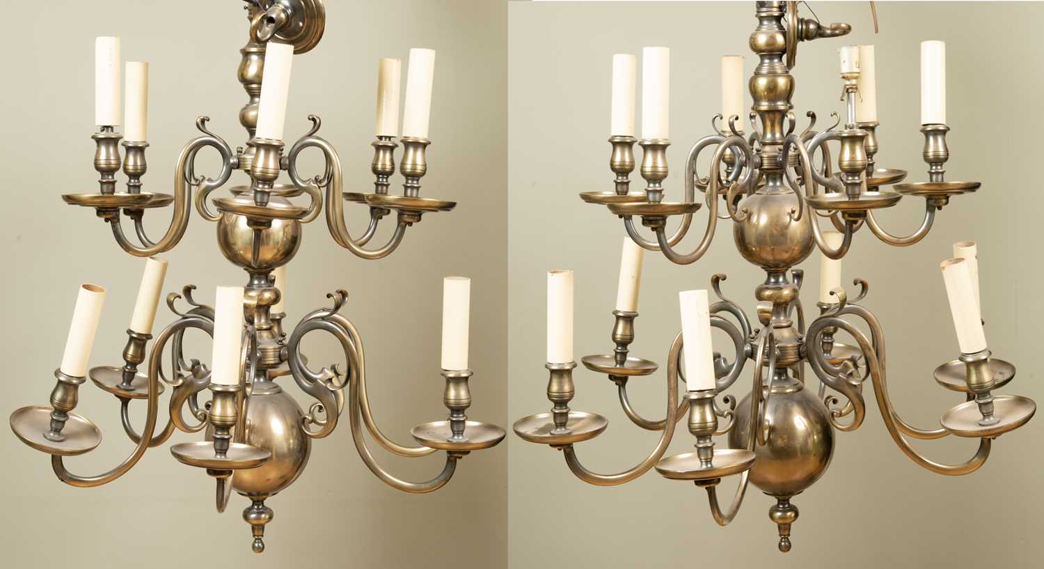 An 18th century dutch-style brass twelve-light chandelier with scrolling branches, approximately