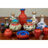 A collection of 20th century Chinese cloisonné and cinnabar lacquer ware to include eleven vases and