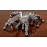 A silver spider ornament, 17.5cm long and with hallmarks underneath (filled)Minor marks otherwise