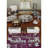 A quantity of silver plate, to include wine bottle coasters, entree dishes, Walker and Hall cutlery,