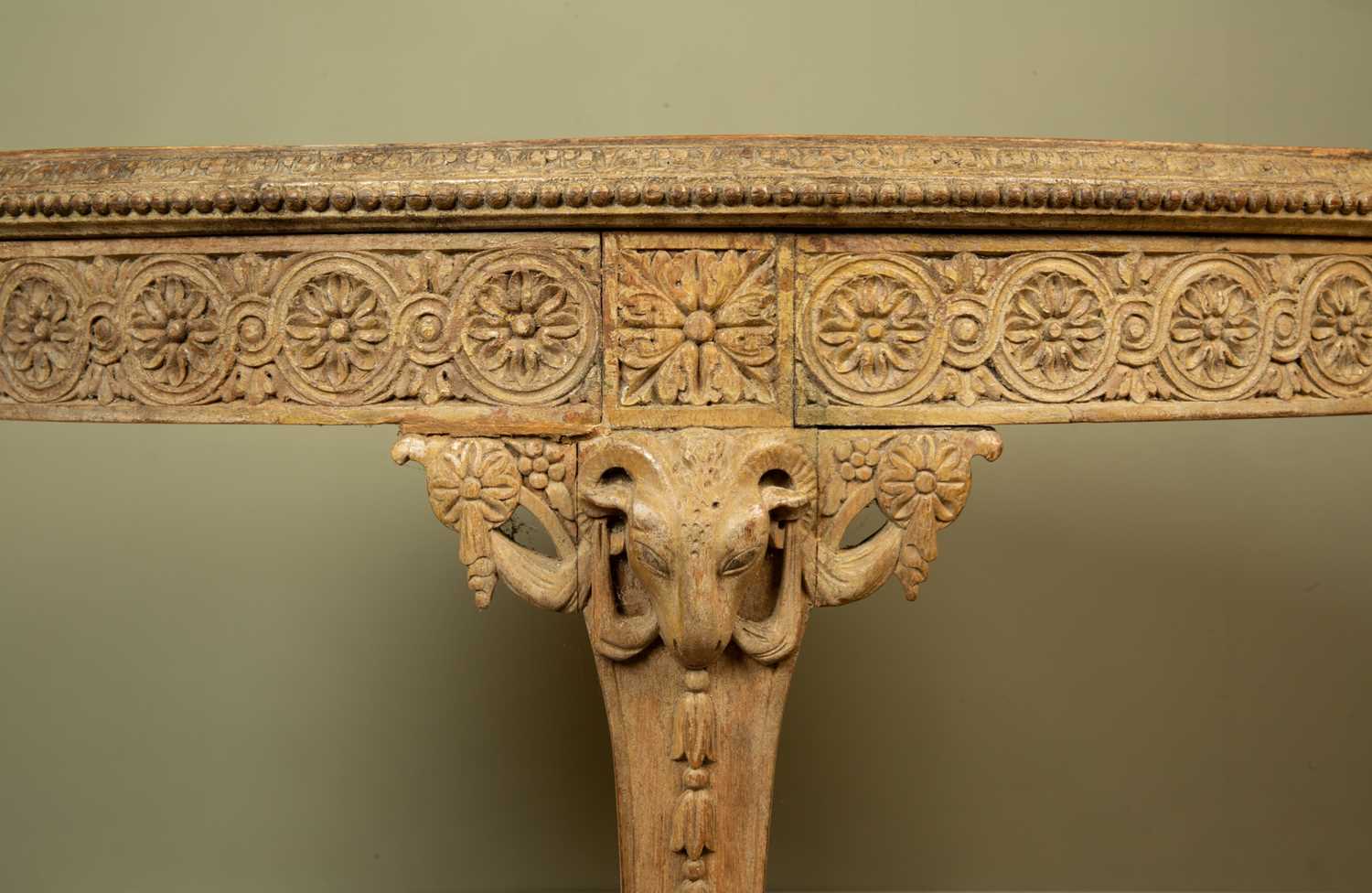 A circular Adam style occasional table with carved wooden edge, rams mask ornament and the legs - Image 2 of 4