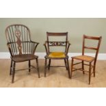 An antique ash and elm Windsor armchair with pierced splat back, 60cm wide x 100cm high; together