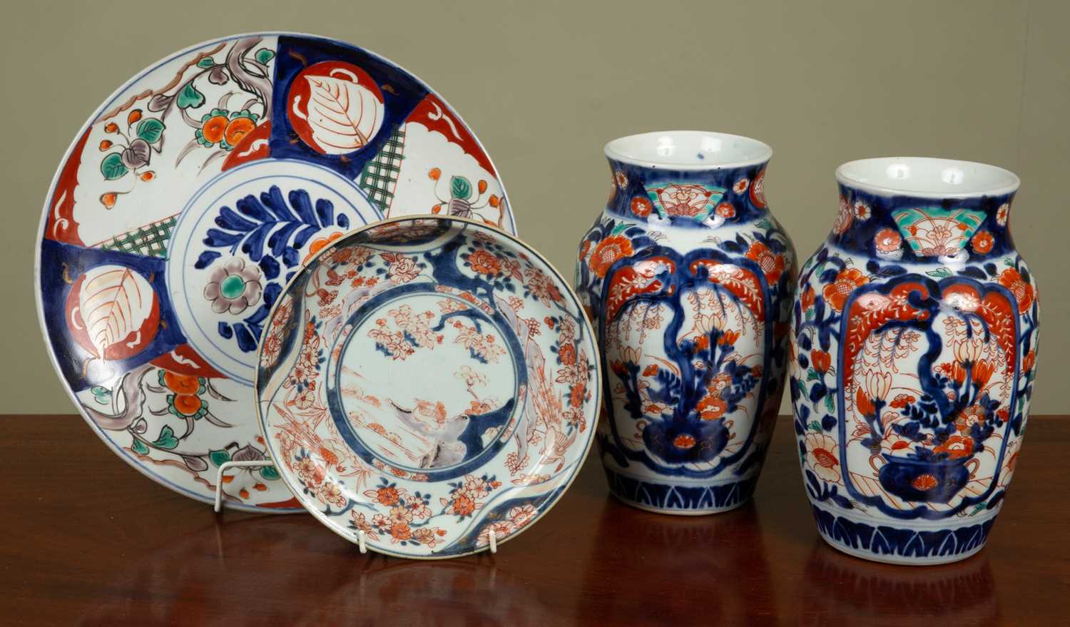 A pair of Japanese Imari vases of baluster form, 14cm diameter x 23cm high; together with an antique