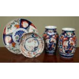 A pair of Japanese Imari vases of baluster form, 14cm diameter x 23cm high; together with an antique