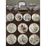 A 19th century part tea set with rose decorations, unmarked and with a teapot, teacups, coffee cups,
