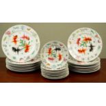 A 20th century Chinese porcelain dinner service comprising eight plates, 26cm diameter; eight