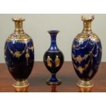 Two Royal Crown Derby porcelain vases with blue ground and gilt ornament, numbered beneath '875/