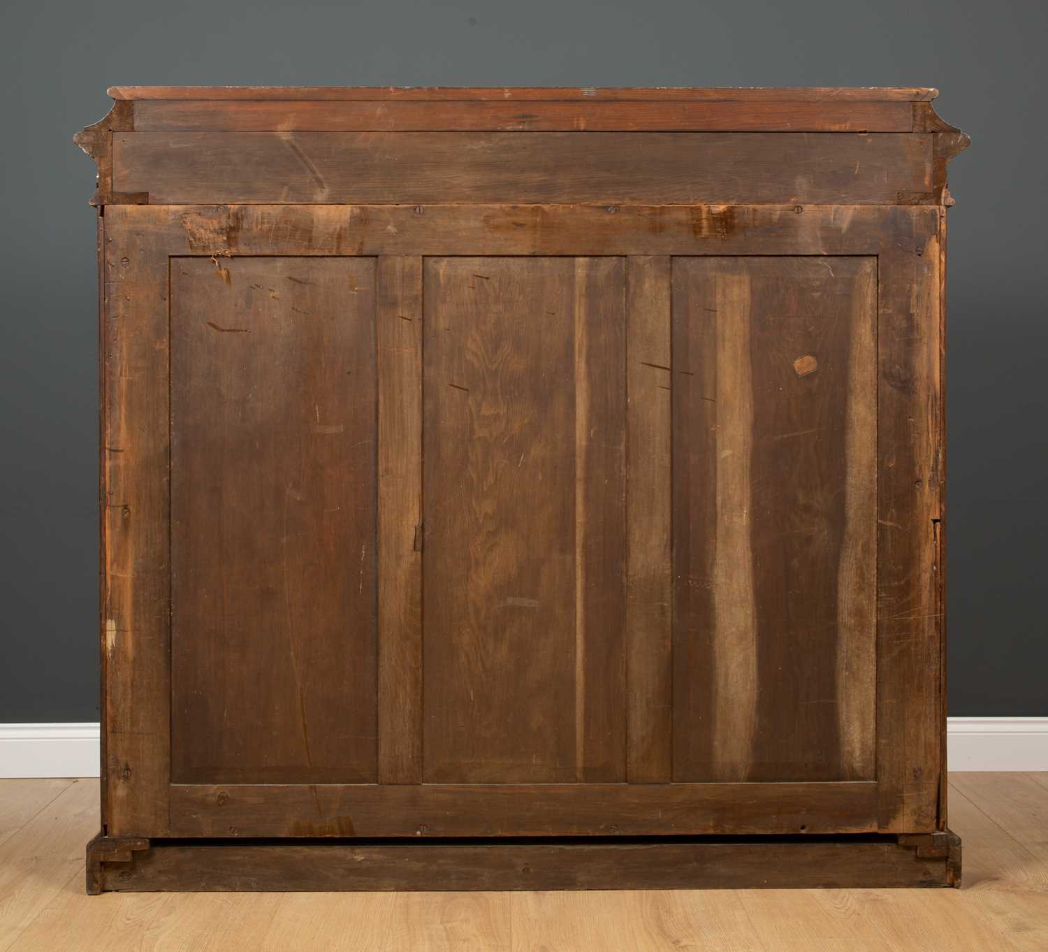 A Victorian oak bookcase with twin glazed doors, two adjustable shelves and a plinth base, 152cm - Image 5 of 5