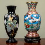 A decorative cloisonne vase on a carved wooden base, 30cm high overall including base; together with