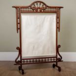 An old chinoiserie style hardwood fire screen with scrolling ornament, 73cm wide x 95.5cm