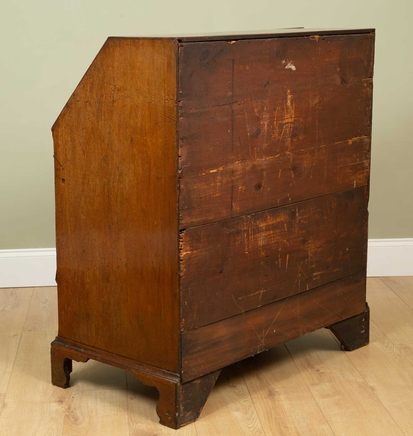 A George III mahogany bureau the fall front enclosing a fitted interior with drawers and pigeon - Image 4 of 12