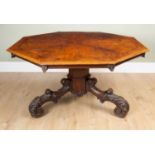 A Victorian walnut octagonal centre table with cross banded decoration and ebony stringing to the