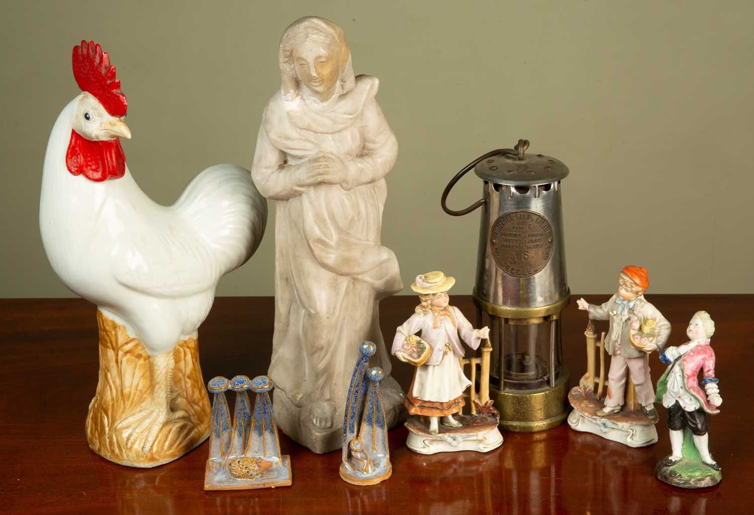 A modern Chinese porcelain chicken, 35cm high; an alabaster sculpture of a lady in classical costume