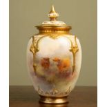 A Royal Worcester porcelain ovoid vase and pierced cover, decorated by Harry Stinton with highland