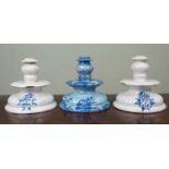 Three Cantigalli tin-glazed squat candlesticks, two with crests, all marked beneath, 16cm diameter x