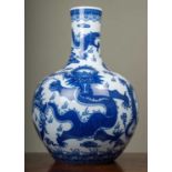 A contemporary large Chinese blue and white vase decorated with dragons, with four character mark