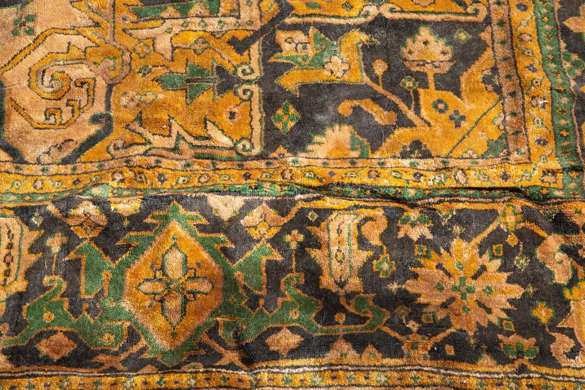 A modern 20th century blue and yellow ground small carpet, decorated with geometric designs within a - Image 4 of 4