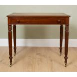 A William IV or early Victorian mahogany writing table with brown leather inset top, single frieze