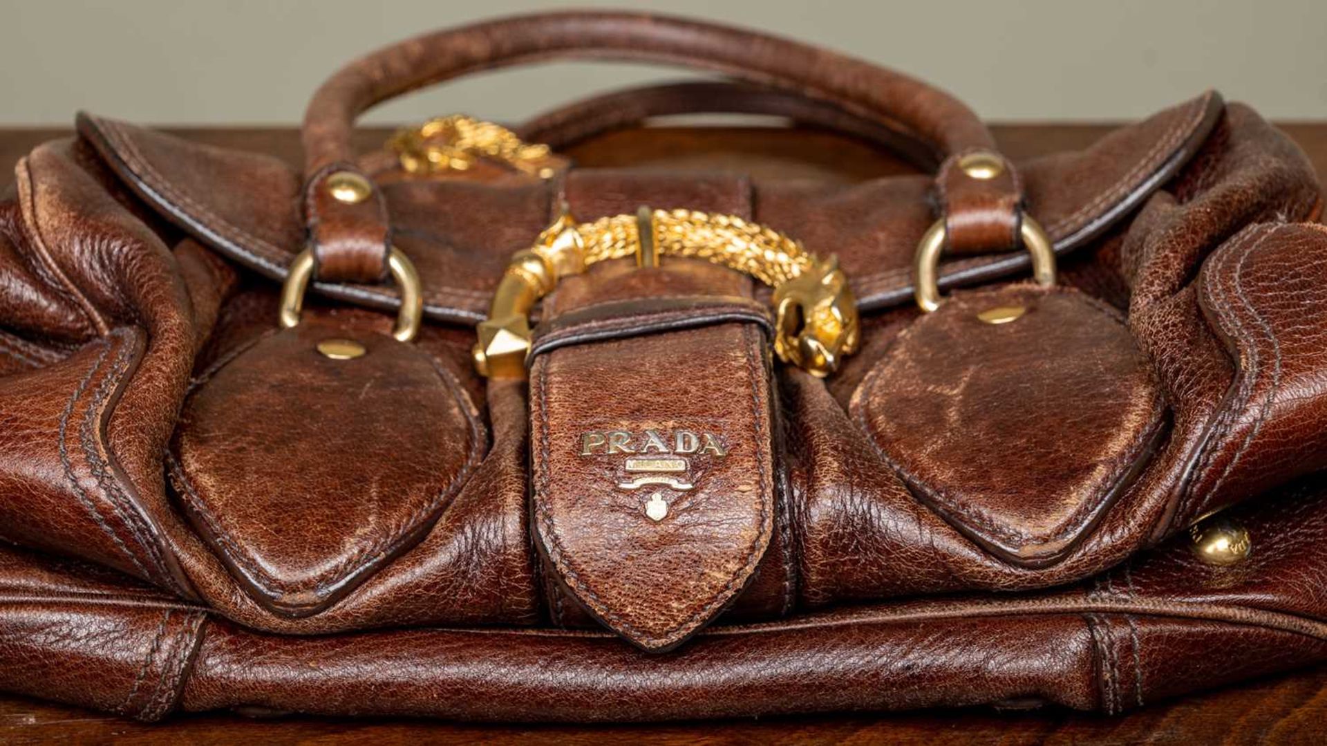 A ladies Prada Cervo dragon buckle brown leather bag with additional brown leather tags and - Image 7 of 10