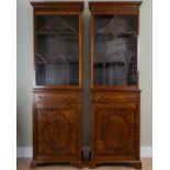 A pair of 19th century and later mahogany library bookcases, with astragal glazed doors enclosing