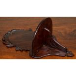 A mahogany wall bracket with decoratively cast and pierced decoration, 22cm wide x 43.5cm high