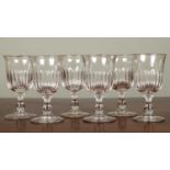 A set of six antique wine glasses with fluted bowls, each approximately 8.2cm diameter x 15cm