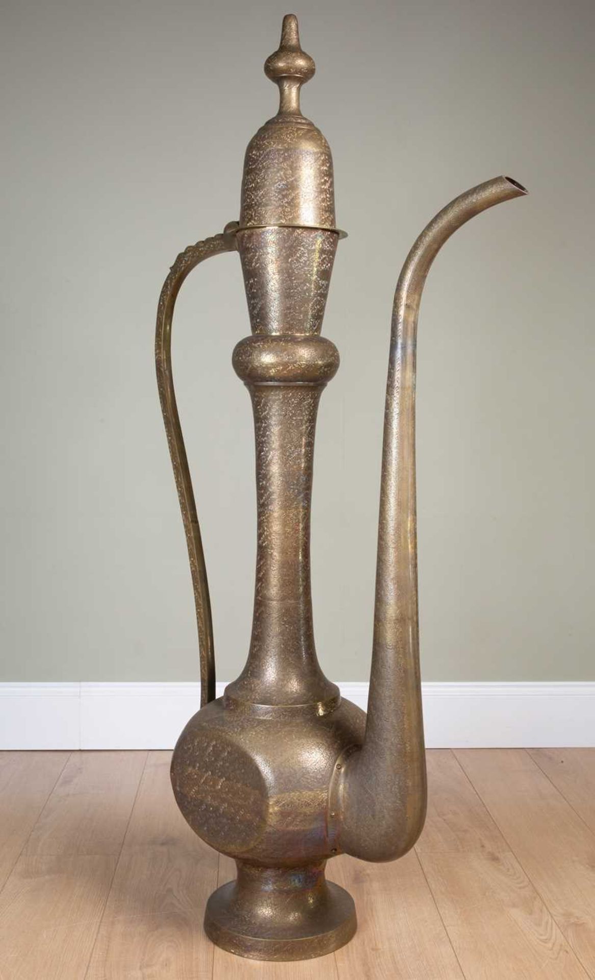 A large decorative Oriental brass display dallah coffee pot with floral chased and engraved - Image 2 of 2