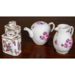 A pair of Meissen-style porcelain flower decorated tea canisters, each 9cm wide x 11.5cm high,