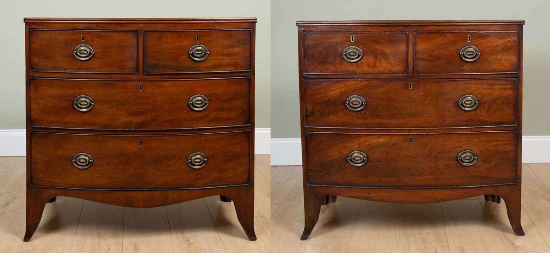 Two similar 19th century mahogany bow fronted chests of two short and two long drawers with splaying