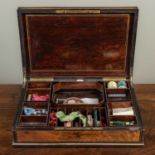 A 19th century French burr walnut, rosewood banded and brass inlaid work box, the top with foliate