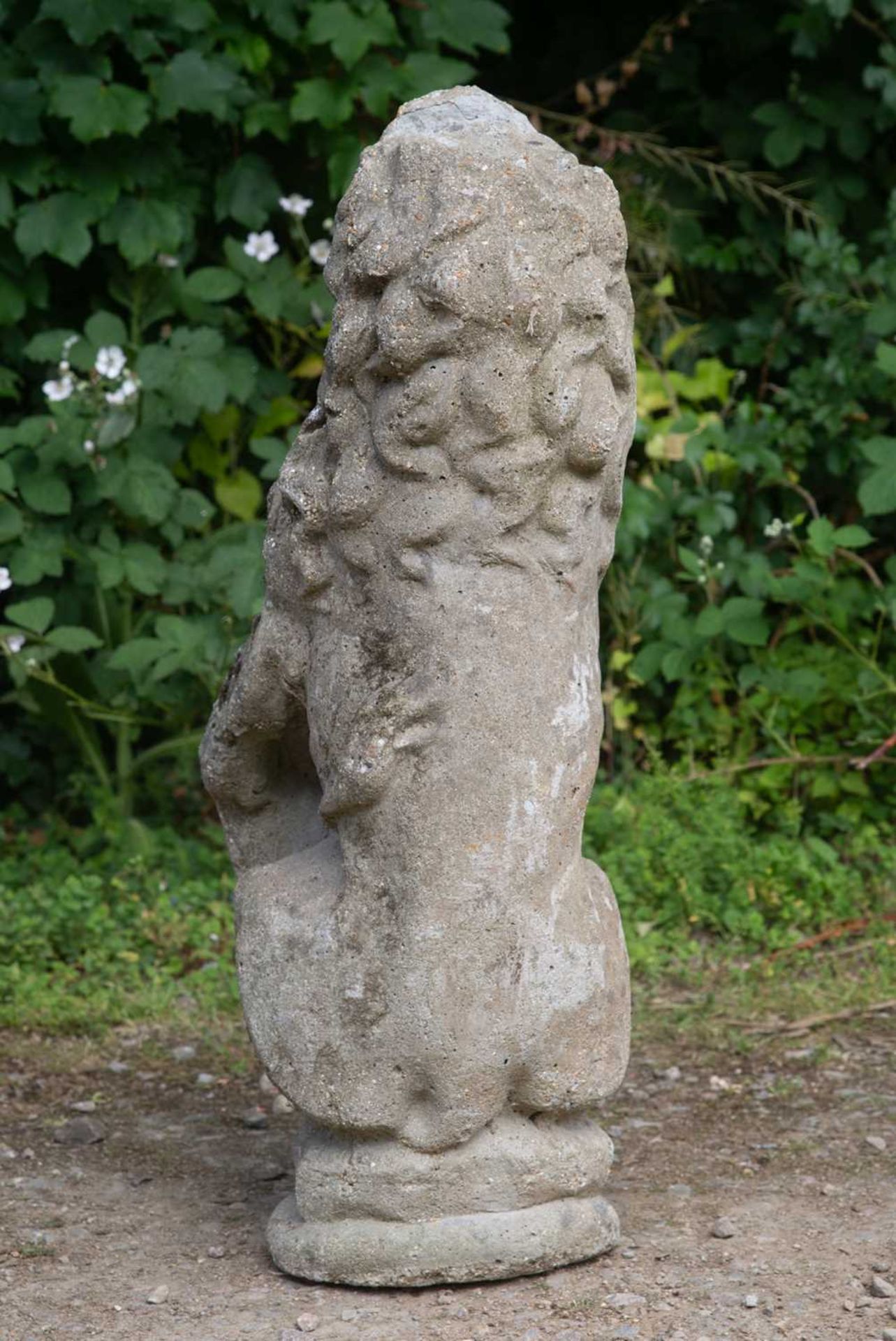 An old cast reconstituted stone lion supporting a shield, 28cm wide x 88cm highSome minor signs of - Image 3 of 4