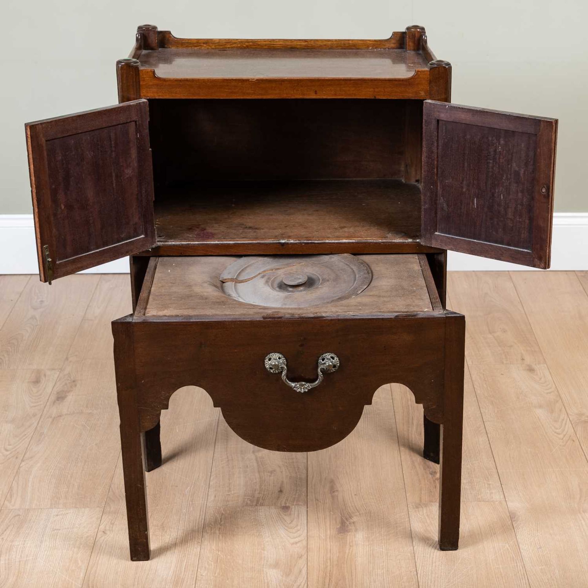 A George III mahogany pot cupboard with galleried top over twin panelled doors and pull out - Image 2 of 4