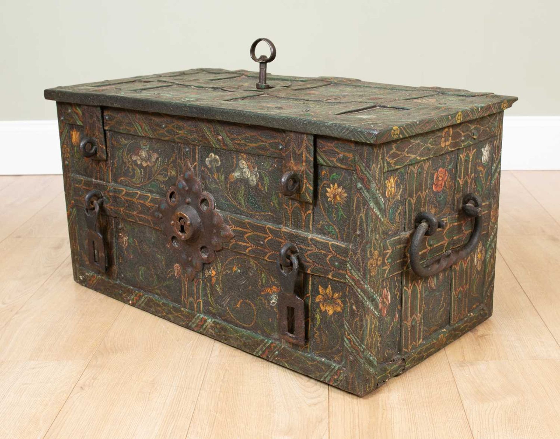 A 17th/18th century German painted iron and strapwork Armada chest with carrying handles to the