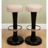 A pair of retro black painted bar stools with circular seats, 37cm diameter x 86cm high (2)Some