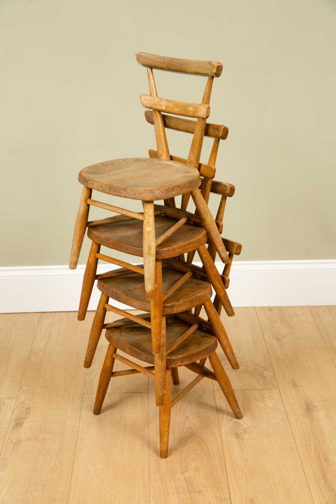 A set of four child-sized Ercol light elm chairs with blank cartouche dots to the reverse, - Image 3 of 4