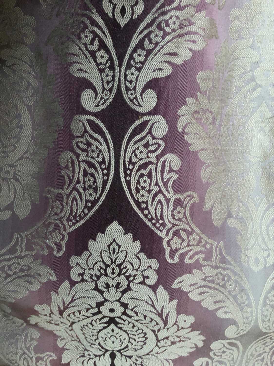 Two pairs of purple coloured curtains together with a further single curtainOne pair of curtains