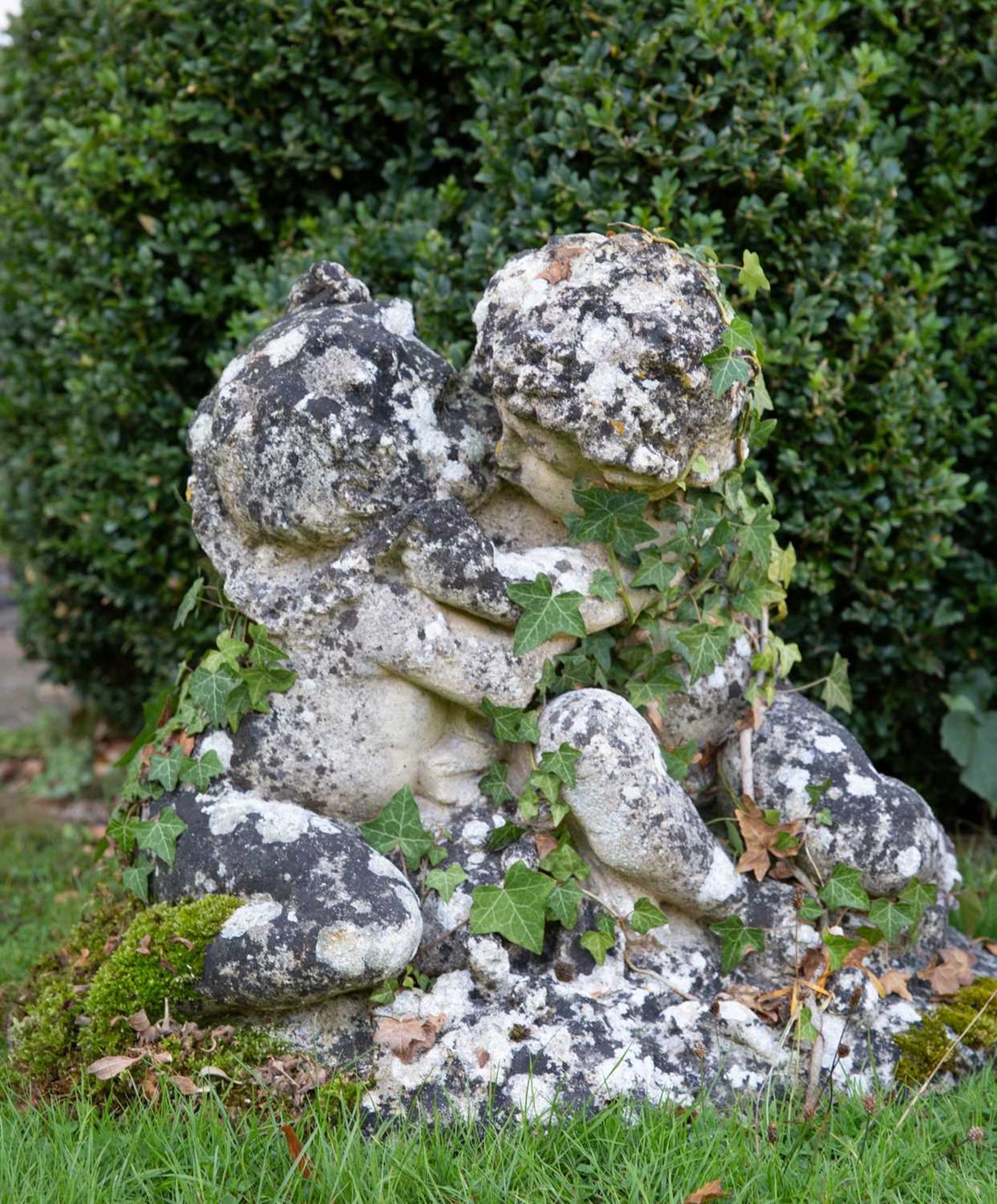 Two cast reconstituted stone groups of putti, each 64cm wide x 48cm high (2)Qty: 2In weathered - Image 3 of 6