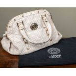 A vintage ladies Versace white leather handbag with cross hatched decoration and studded detail,