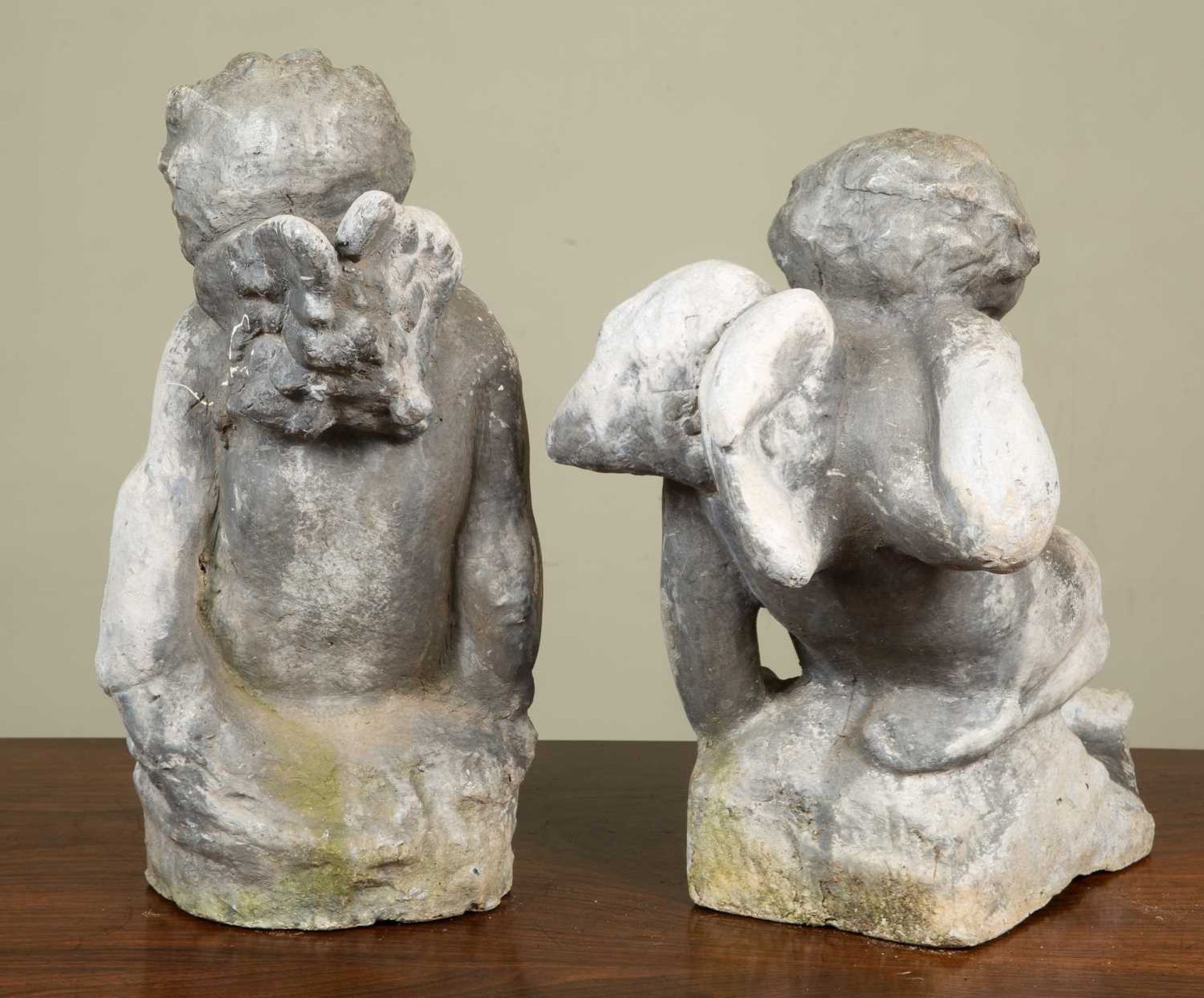 Two antique lead cherubs each in a playful pose, both approximately 36cm in height x 20cm wideSome - Image 3 of 4