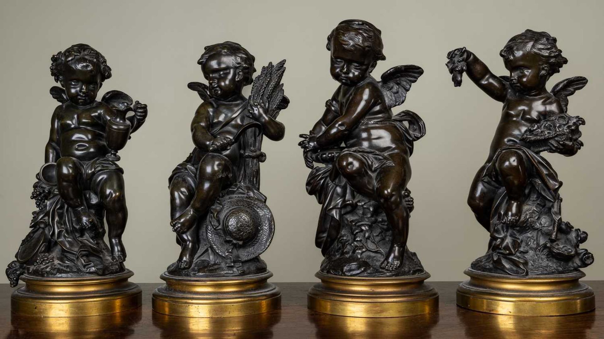 A set of four 19th Century French bronze sculptures depicting the four seasons as Cherubs, unsigned,