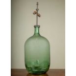 A decorative table lamp with carboy bottle base, 82cm highIn need of rewiring otherwise in good