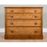 A Victorian satin birch chest of four longs graduated drawers with turned knob handles and