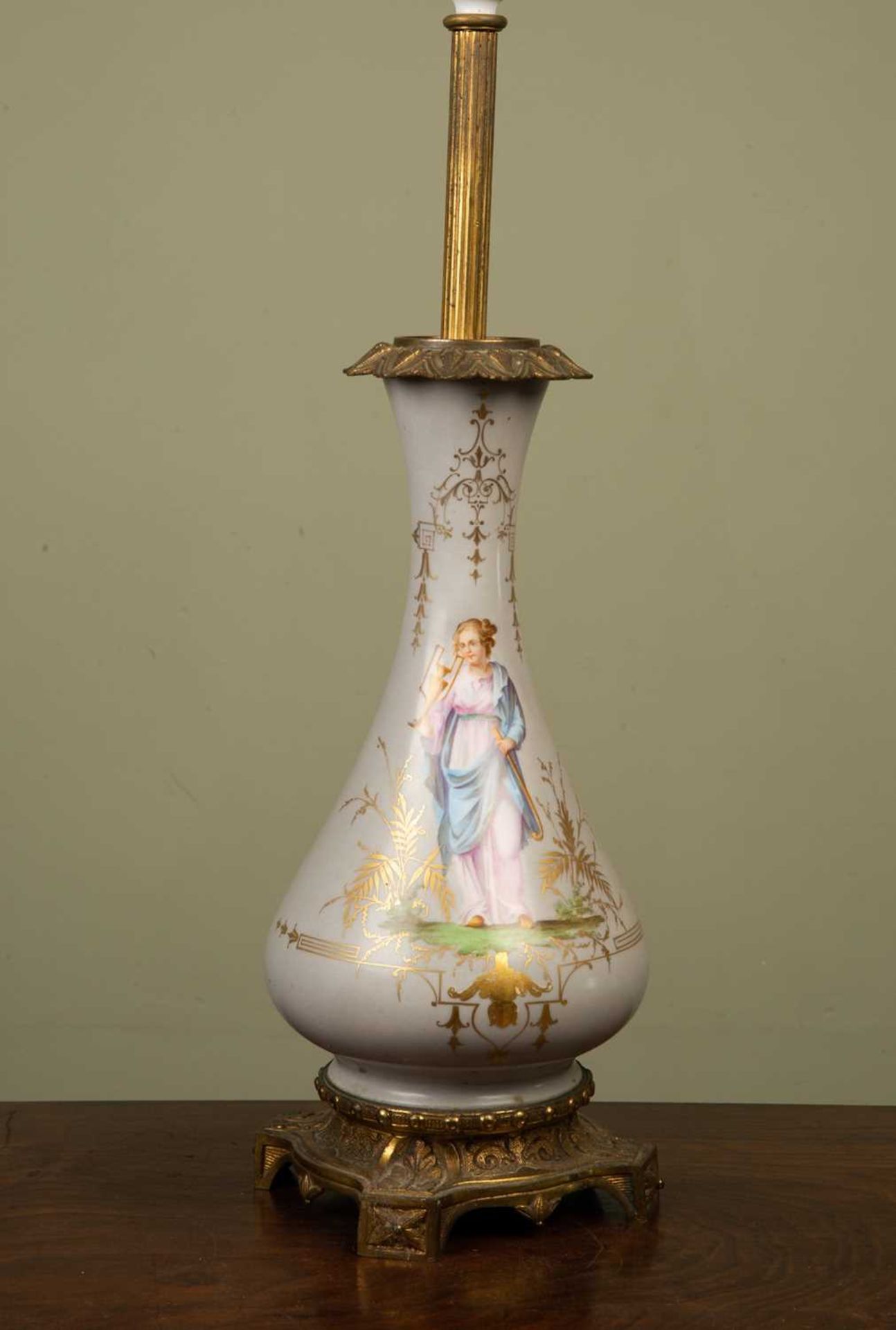 A continental porcelain oil lamp base of baluster form decorated with a classical female, in - Image 2 of 3
