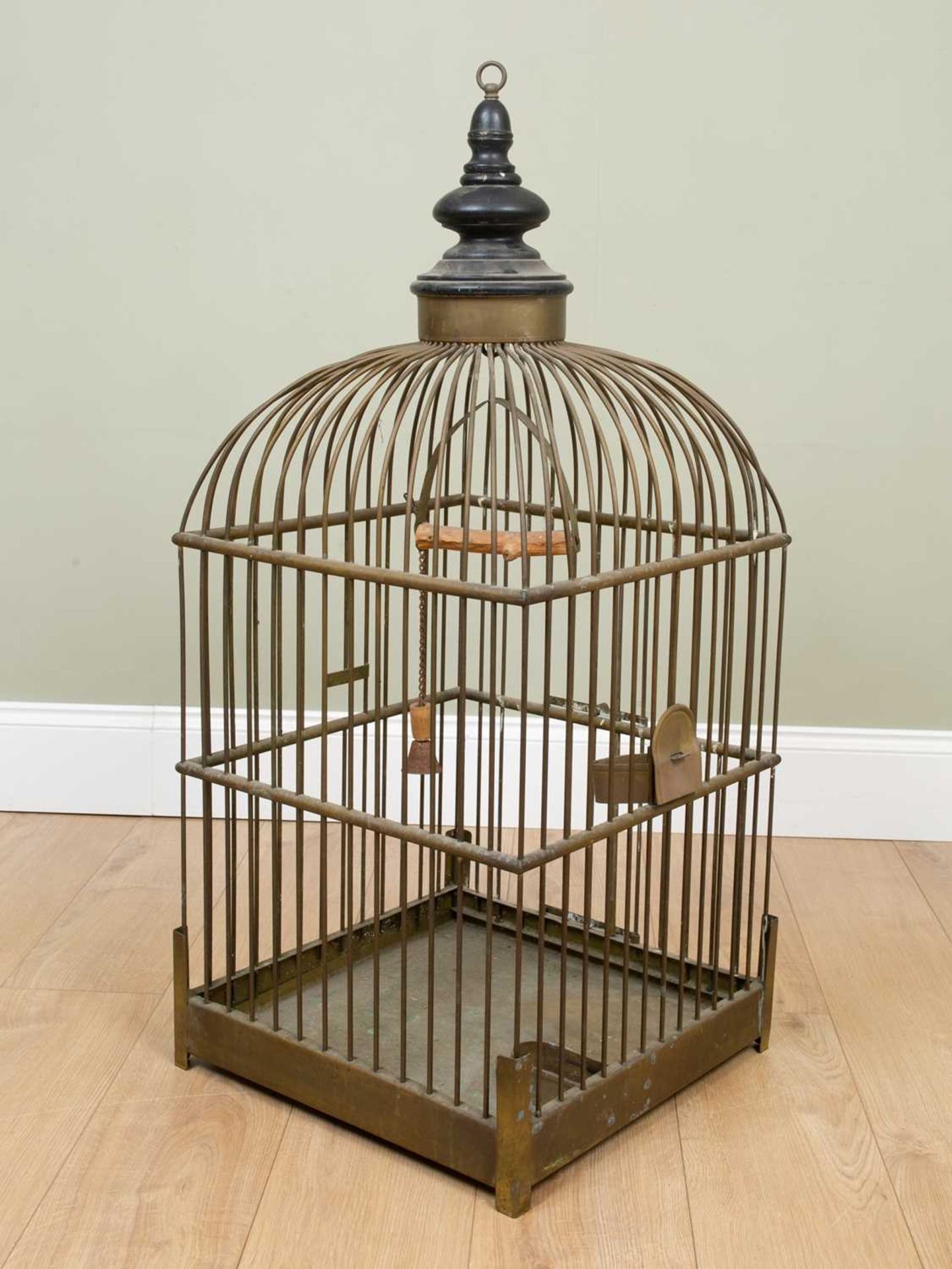A Victorian brass bird cage of square section, with black painted turned finial, a sliding tray to - Image 2 of 2