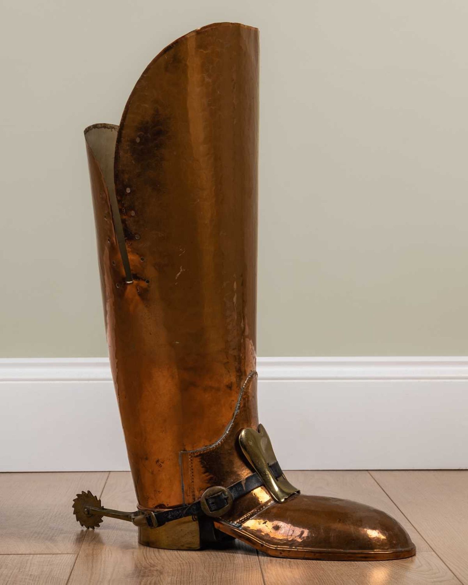 A mid 20th century copper stick stand in the form of a boot, 58cm highMinor marks, dents and