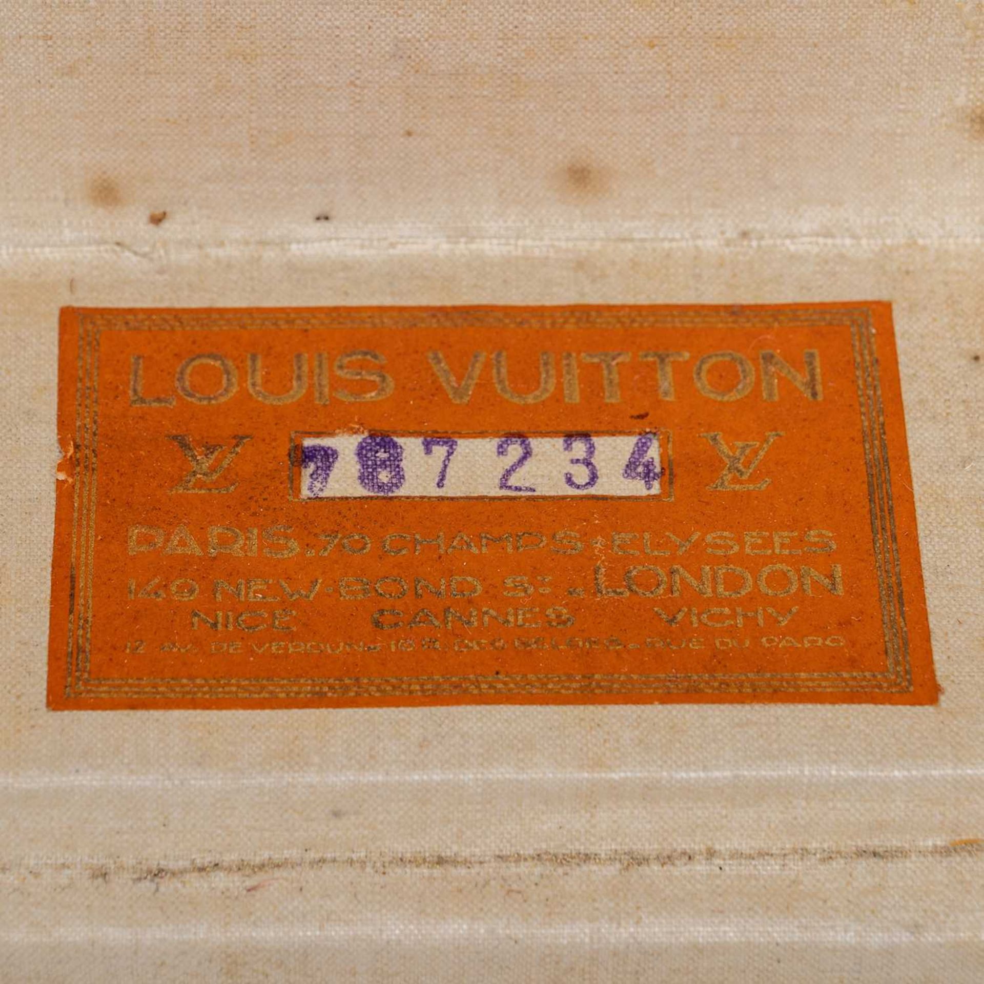 A vintage Louis Vuitton suitcase, early 20th century, with leather carrying handle, the lock - Image 9 of 11