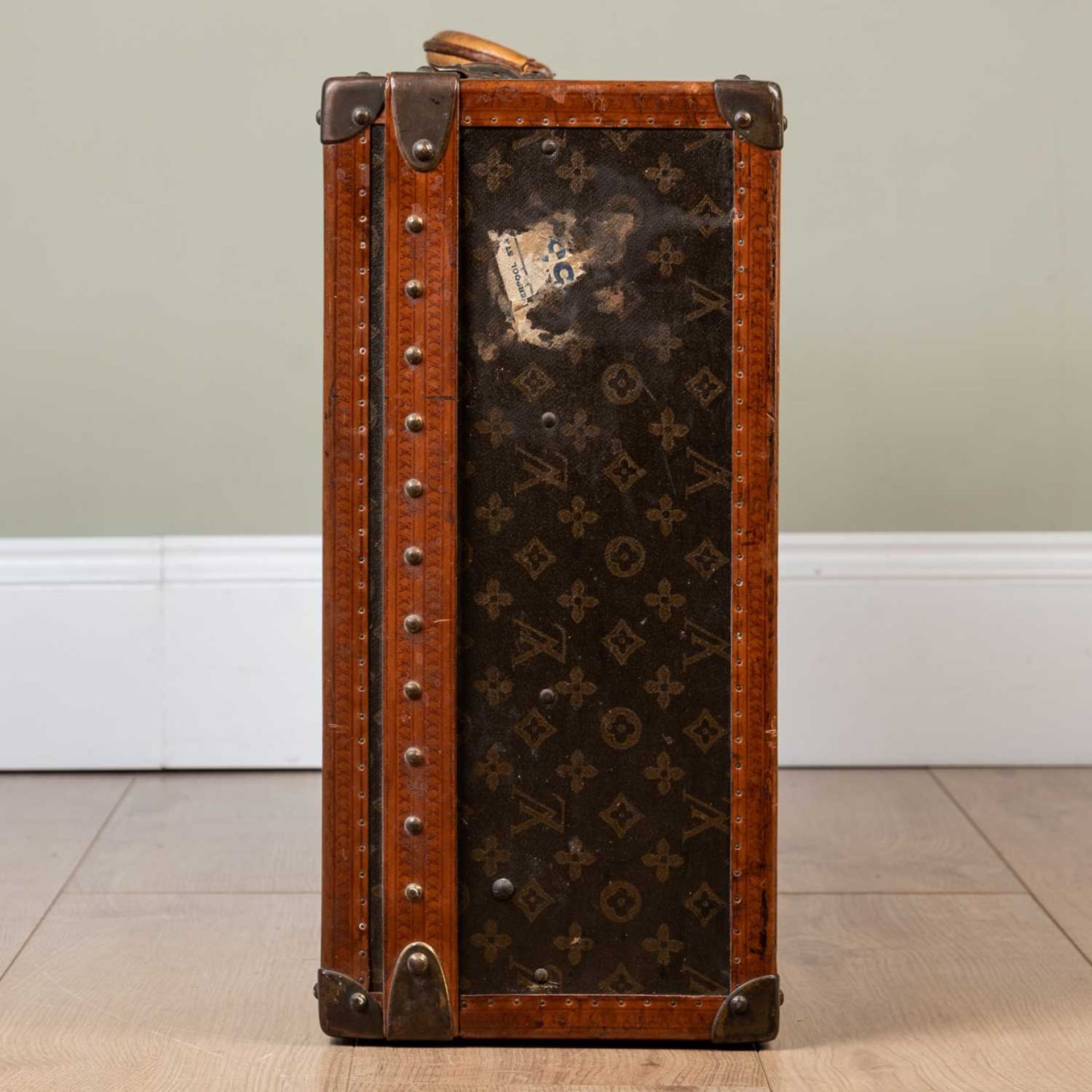 A vintage Louis Vuitton suitcase, early 20th century, with leather carrying handle, the lock - Image 3 of 11