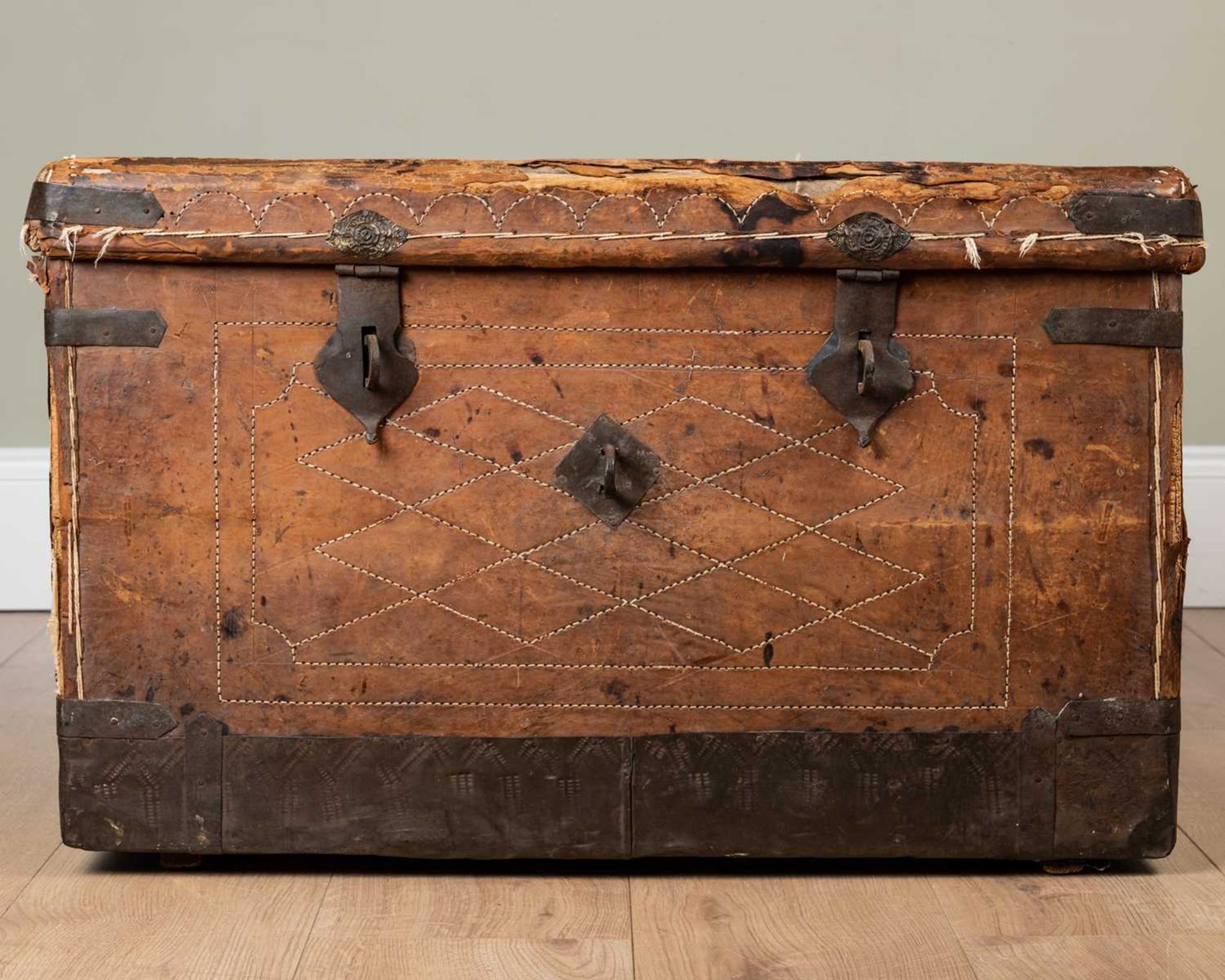 A 19th century leather and iron bound trunk with wrought iron carrying handles to the side and - Image 2 of 7