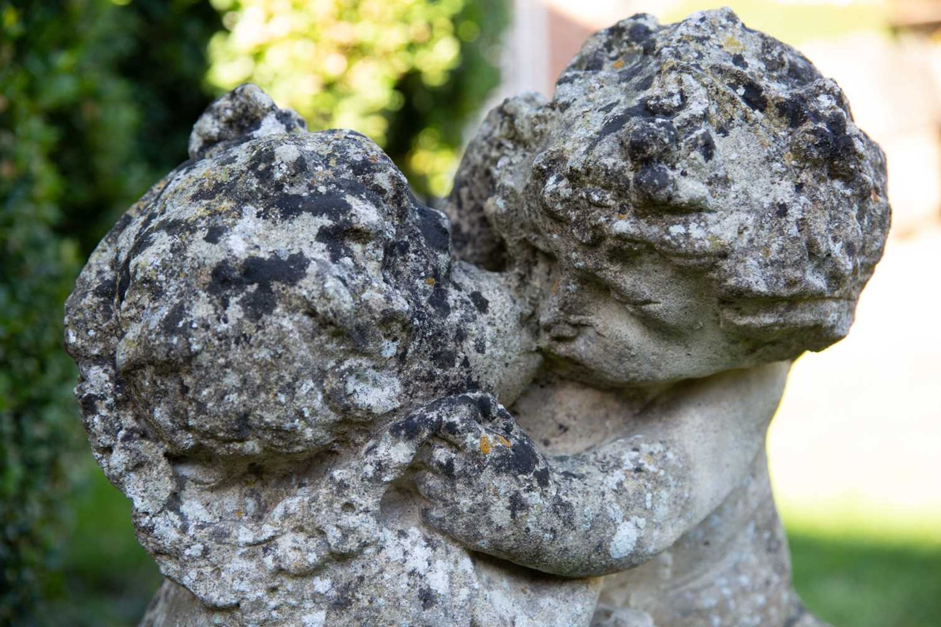 Two cast reconstituted stone groups of putti, each 64cm wide x 48cm high (2)Qty: 2In weathered - Image 6 of 6