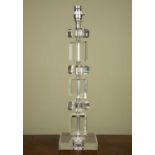 A French bock glass contemporary table lamp, the sectional stem on a square base, 50cm high
